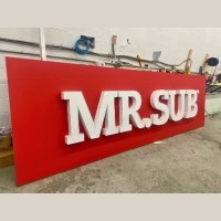 Custom MR.SUB restaurant sign featuring 3D channel letters and professional commercial signage fabrication for storefront branding.
